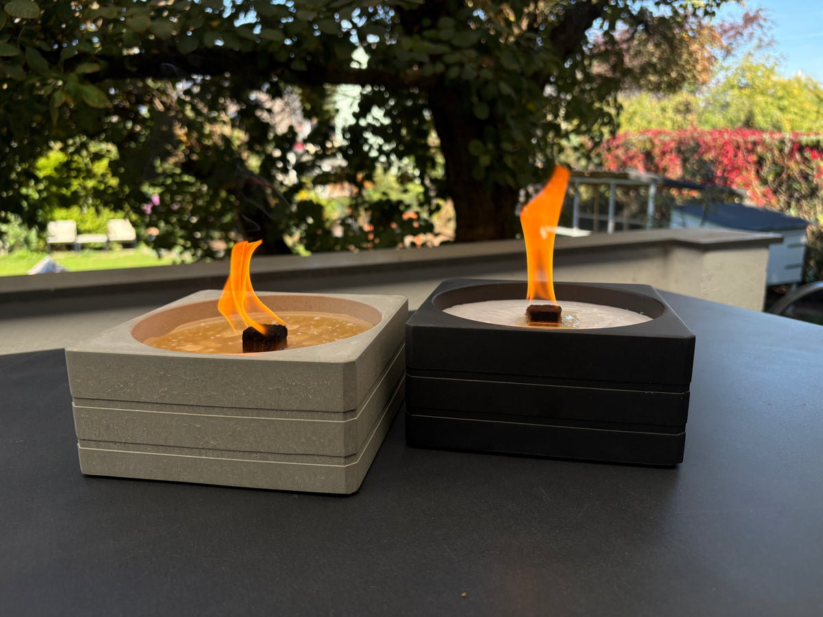 Dauerfeuer SQUARE in Grau und Anthrazit nebeneinander
