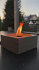 Dauerfeuer SQUARE in Grau – Flamme in Bewegung